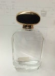 leather cap perfume bottle